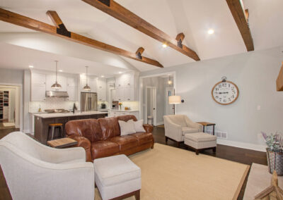 Lowell House Living Area and view into Kitchen Area